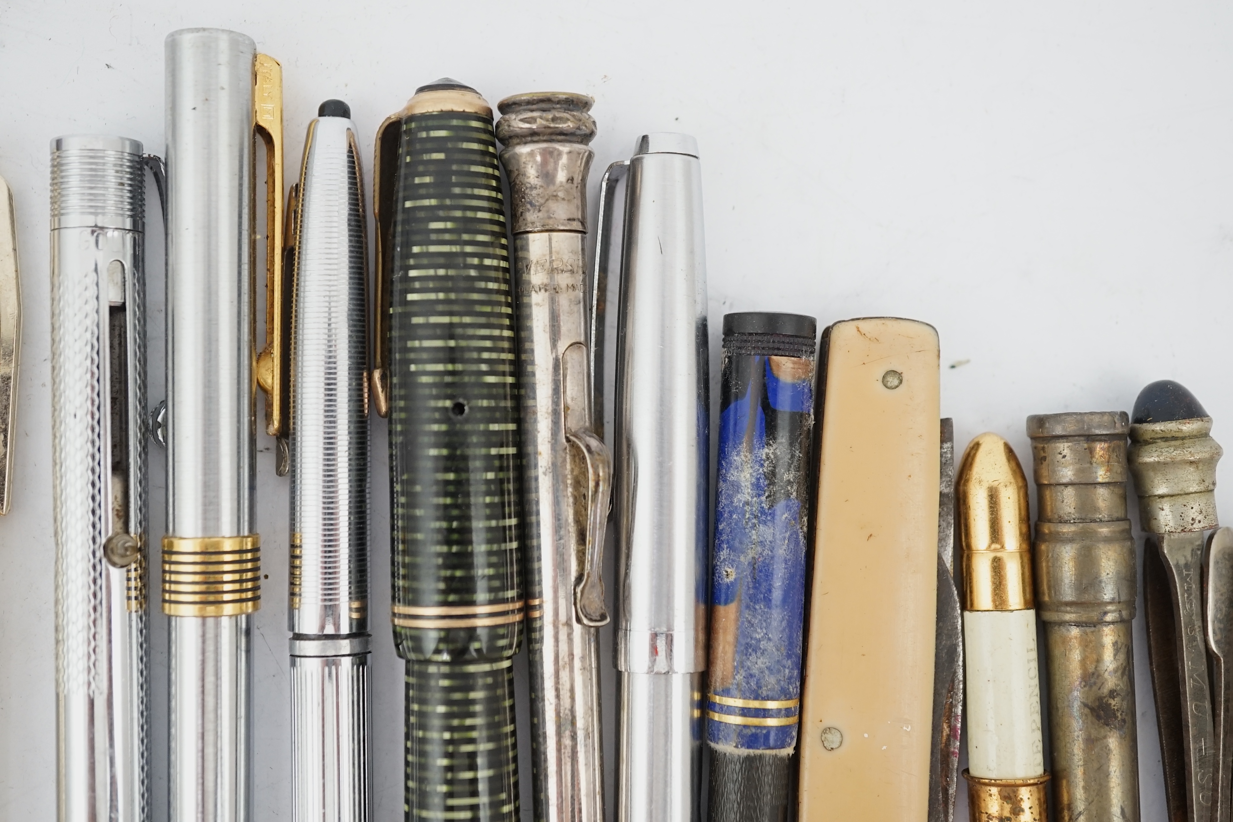 A collection of pens, pencils and stationery equipment, including a Parker Vacumatic